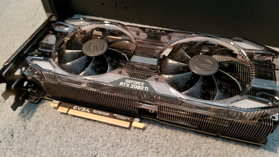 A worker carefully inspecting a bitcoin miner at a mining farm, ensuring its optimal performance.