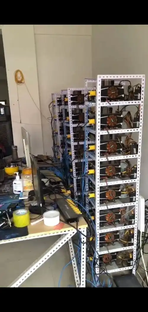 An aerial view of a expansive Indian mining farm utilizing wind turbines for sustainable operations, highlighting eco-friendly crypto extraction